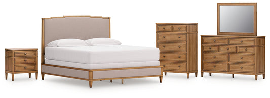 Sharlance California King Upholstered Panel Bed with Mirrored Dresser, Chest and Nightstand
