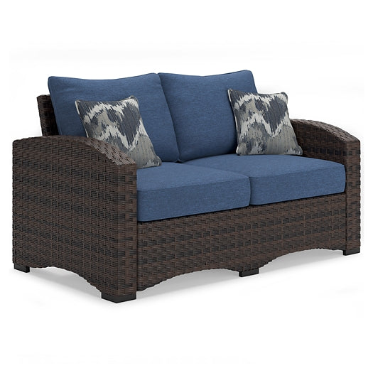 Ashley Express - Windglow Outdoor Loveseat and 2 Chairs with Coffee Table