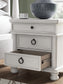 Ashley Express - Rowlenstown Three Drawer Night Stand