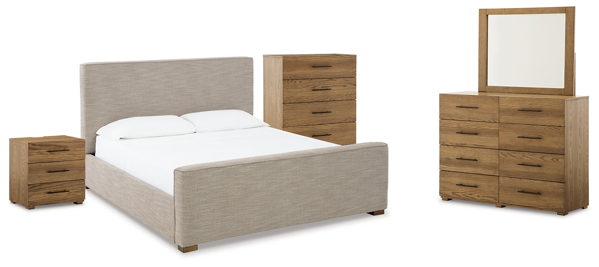 Dakmore California King Upholstered Bed with Mirrored Dresser, Chest and Nightstand
